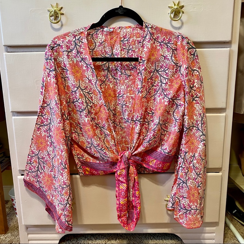 SOLD Floral bell sleeve wrap top